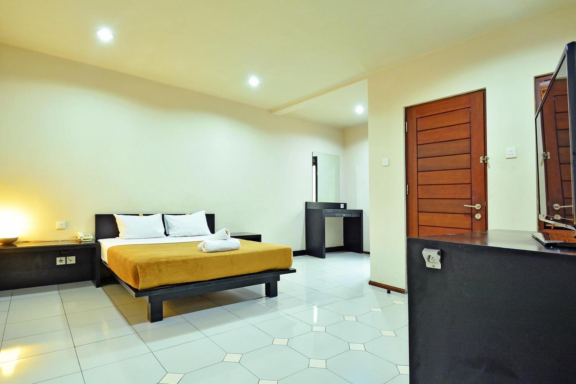 Taman Ayu Town House Aparthotel Legian Quarto foto