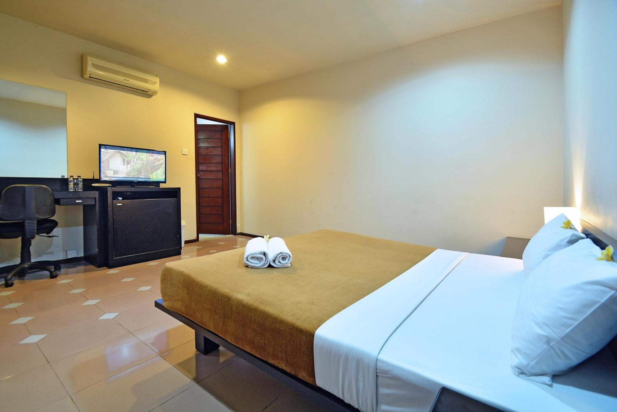 Taman Ayu Town House Aparthotel Legian Quarto foto