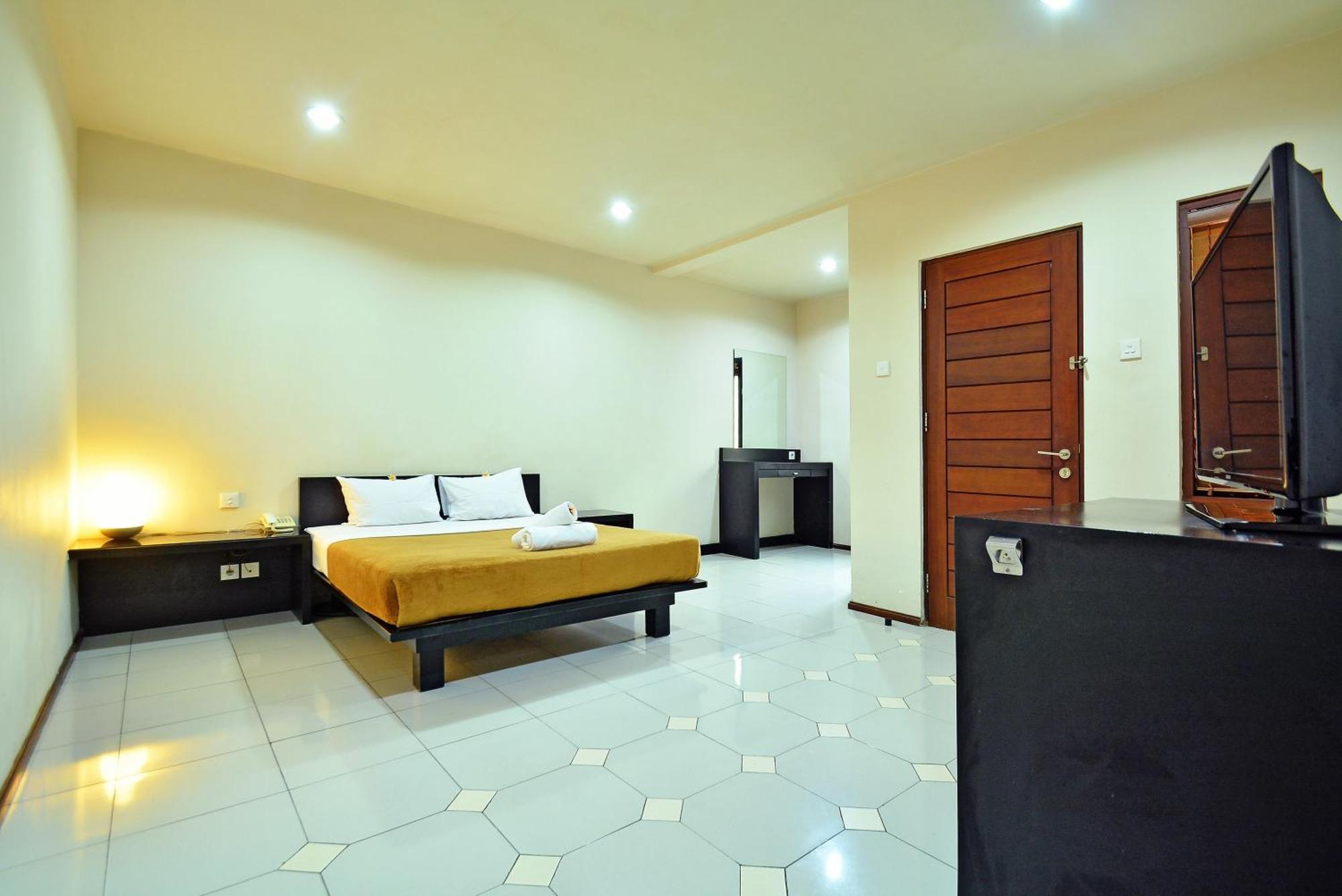 Taman Ayu Town House Aparthotel Legian Quarto foto