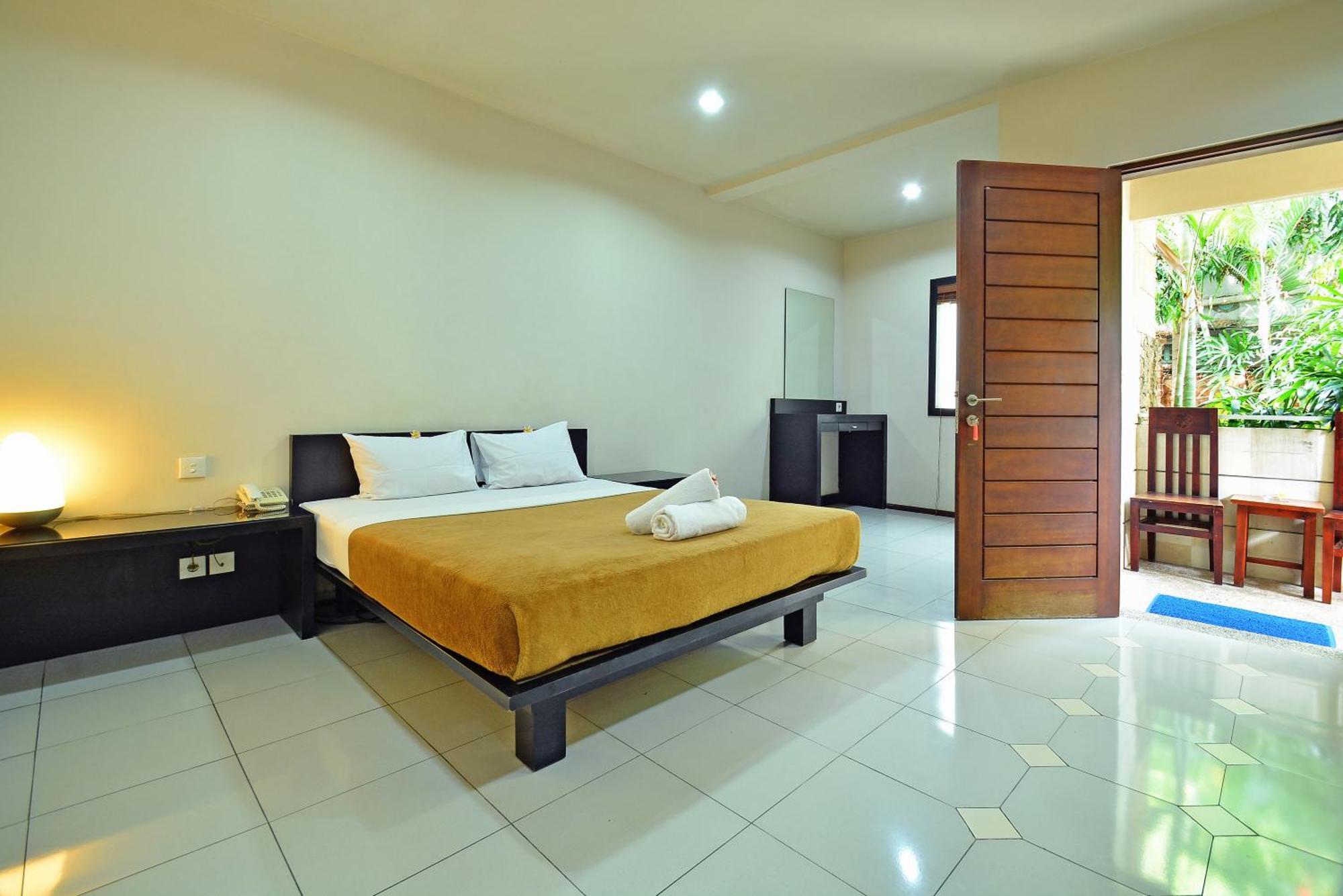 Taman Ayu Town House Aparthotel Legian Quarto foto